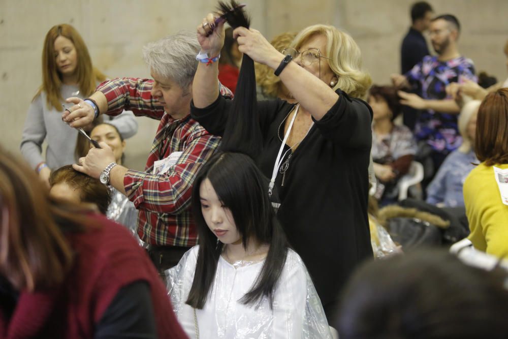 Corte de pelo simultáneo en València