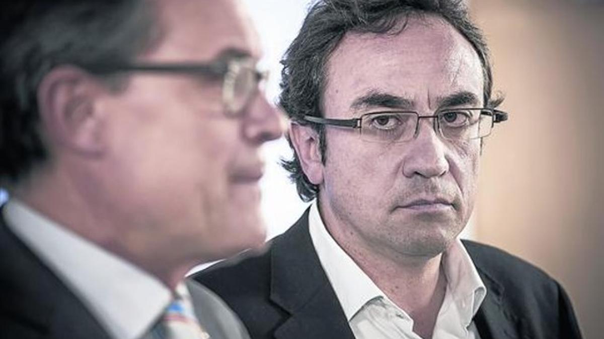 El presidente de la Generalitat y líder de CiU, Artur Mas, y el nuevo coordinador general de CDC, Josep Rull, el pasado 25 de julio.