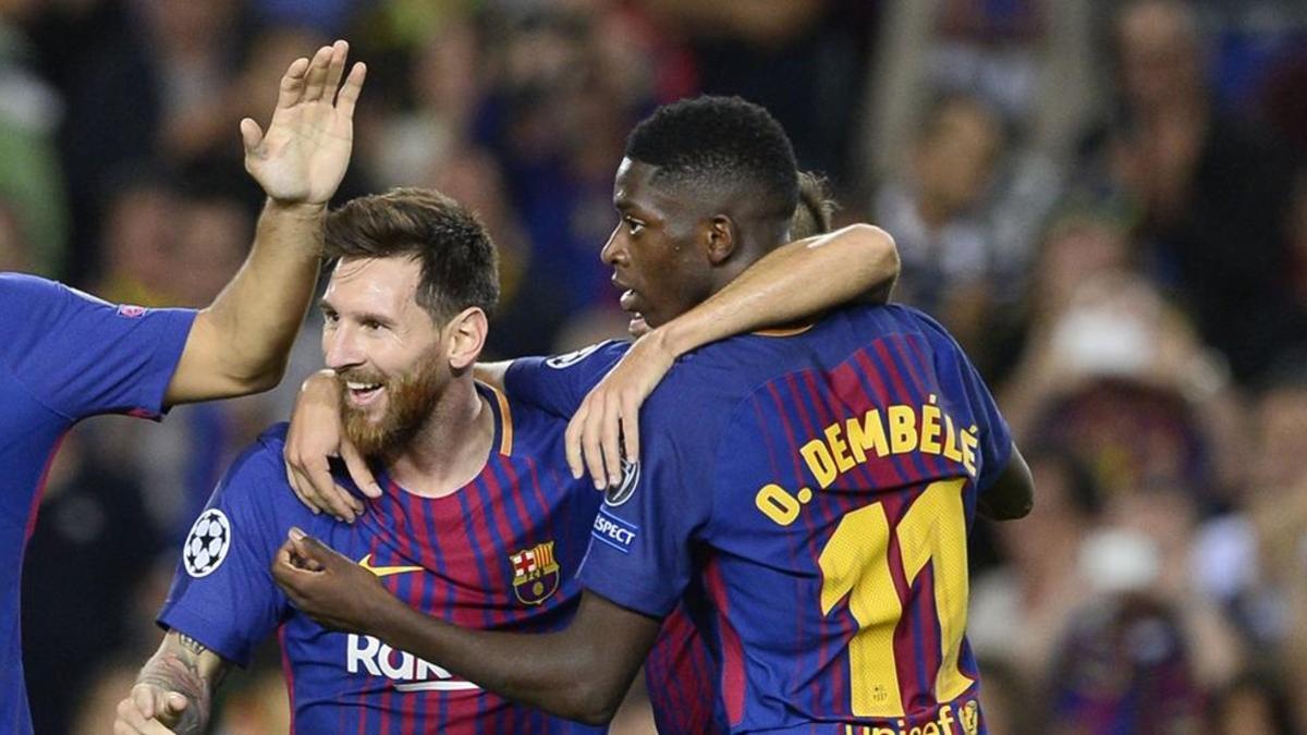 Dembélé, abrazado a Messi