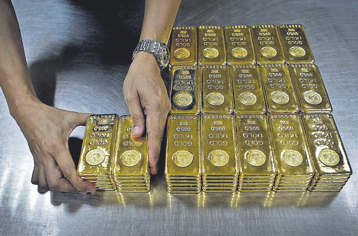 Lingotes de oro de un kilogramo de pureza.