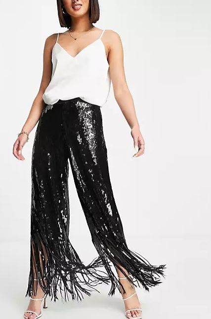 Pantalones negros con flecos y lentejuelas de River Island