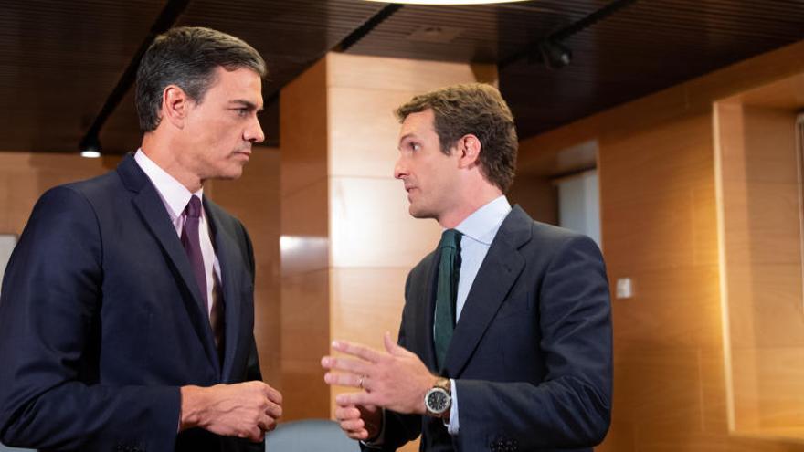 Una fotografía de Pedro Sánchez y Pablo Casado.