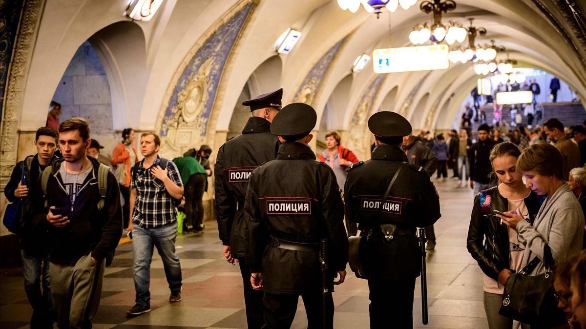 jmexposito43663286 police officers patrol in a metro station in downtown moscow180608185544