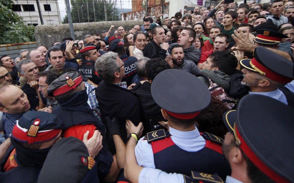 La jornada del 1-O en Cataluña, en imágenes