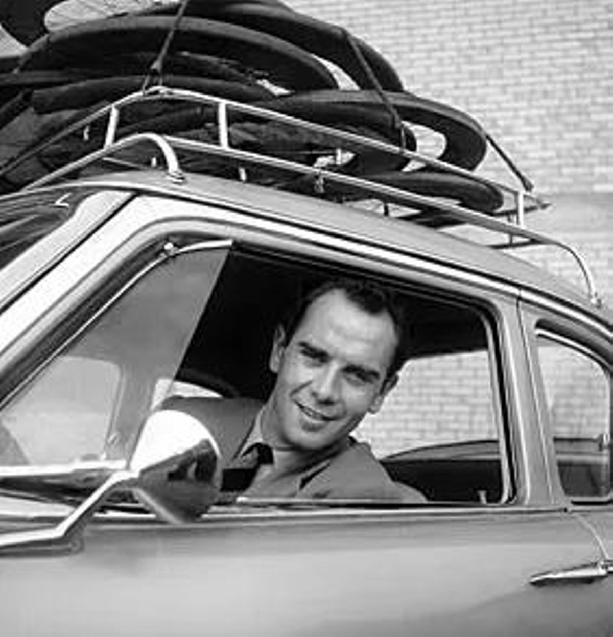 Koblet, en su coche