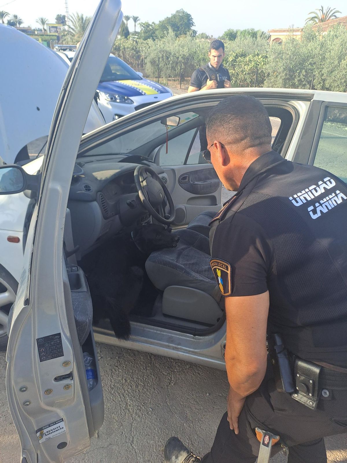 Local Police agents observe the suspect vehicle