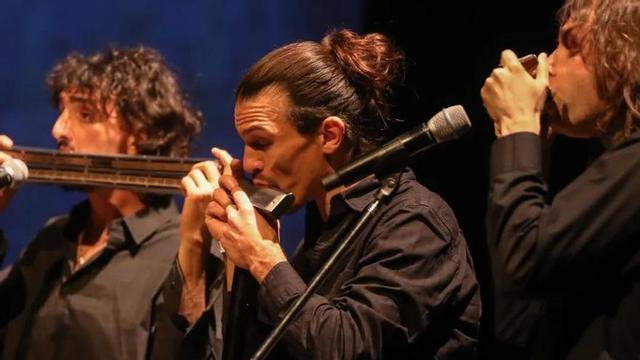 Los tres integrantes de IL Harmonica Trío.