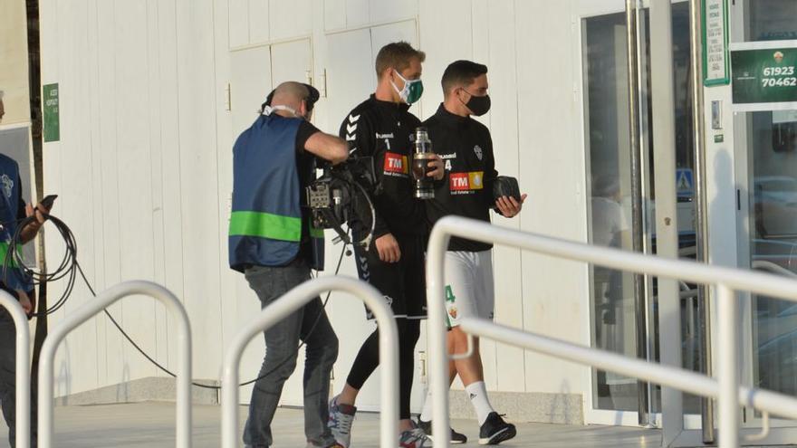 Marcone y Ruso Rodríguez llegando al Martínez Valero