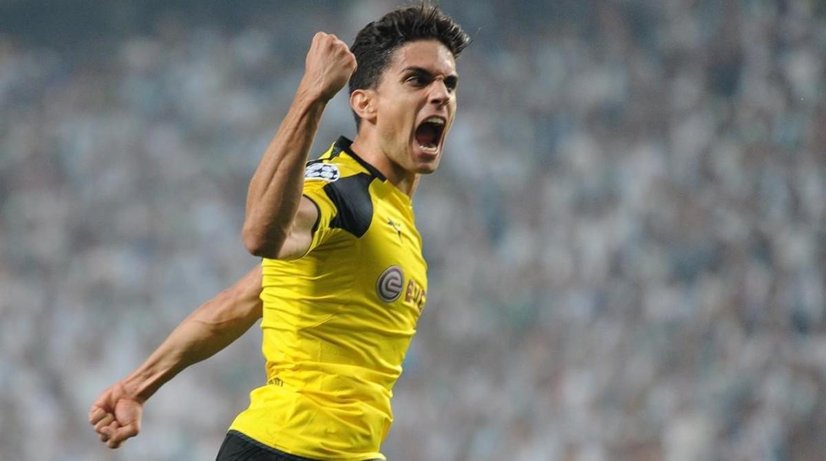 Marc Bartra grita eufórico tras anotar el 0-3 del Dortmund al Legia de Varsovia.