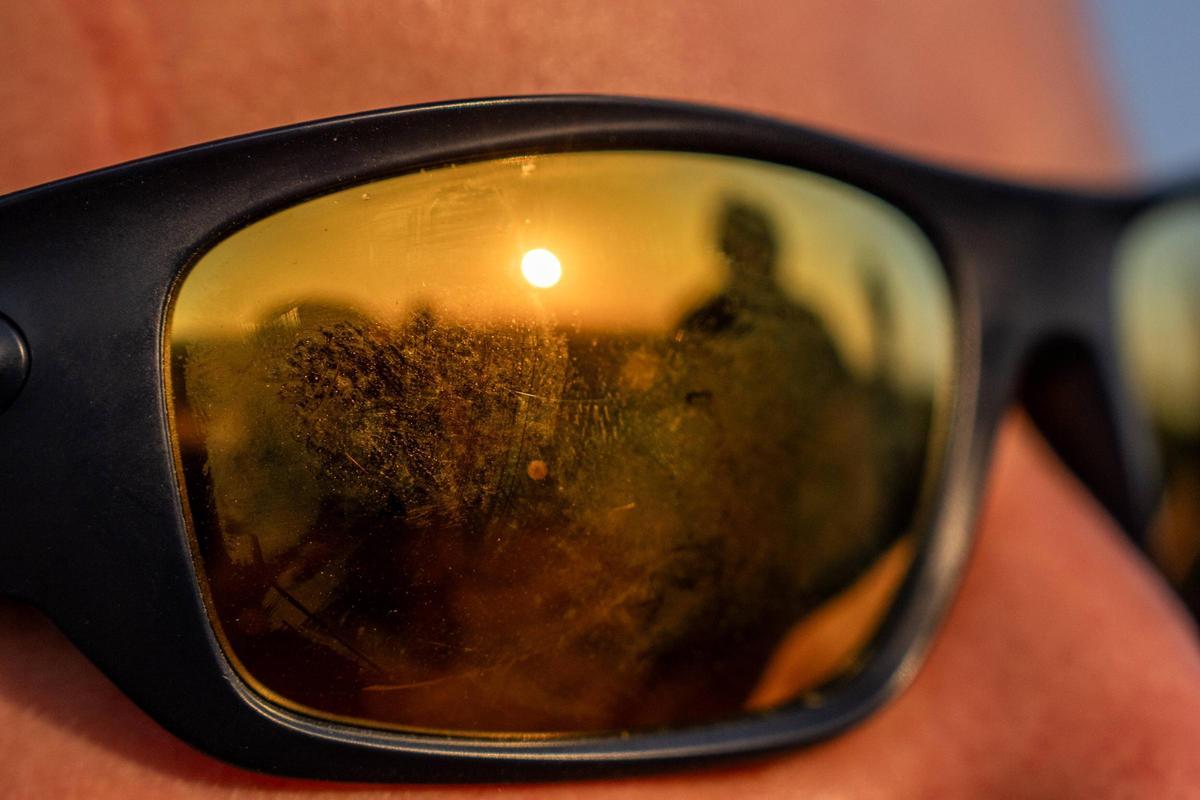 El Sol, reflejado en las gafas de un asistente al concierto del Festival Jordi Savall en Santes Creus.