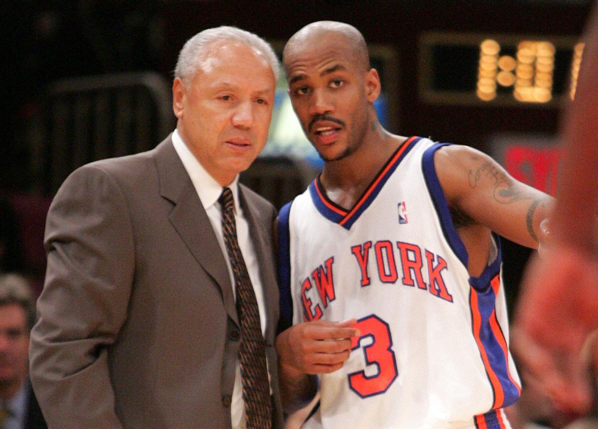 FILE - New York Knicks head coach Lenny Wilkens, left, talks with guard Stephon Marbury during the third quarter against of a basketball game against the Utah Jazz, Oct. 28, 2004 in New York. (AP Photo/Julie Jacobson, File). FILE PHOTO
