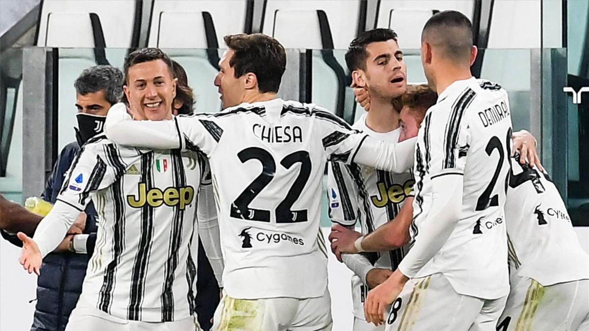 Los jugadores de la Juventus celebran el gol de Morata.