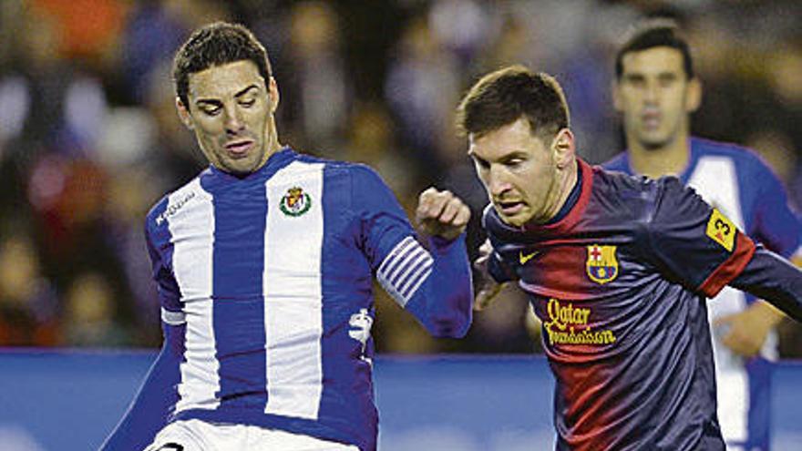 Óscar, con Messi.