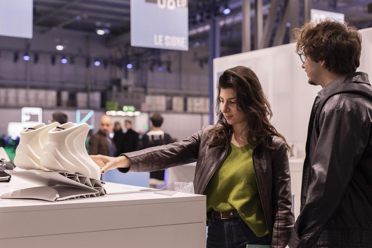 Visitantes en la feria de calzado de Milán.