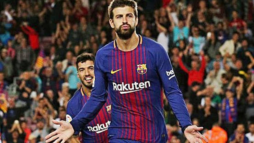 Piqué celebra un gol marcat aquesta temporada al Camp Nou.