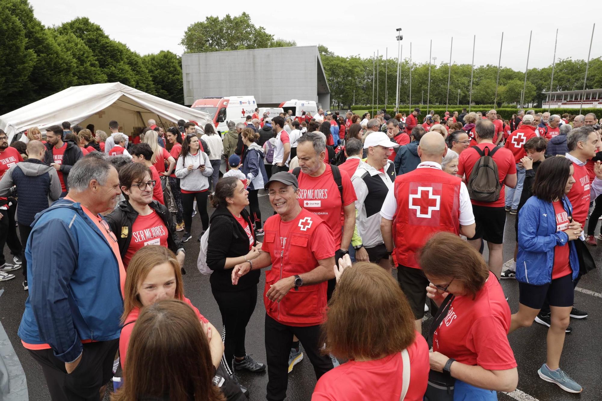 Así fue la marcha solidaria de Cruz Roja en Gijón (en imágenes)