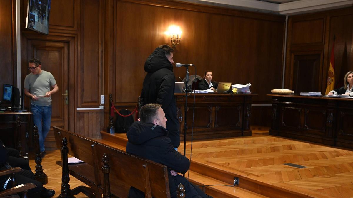 Los dos acusados durante el juicio.