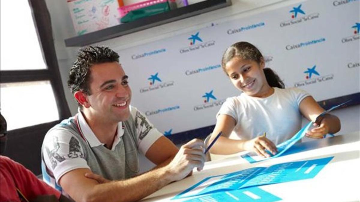 Xavi Hernández en uno de sus actos solidarios como embajador de la Obra Social de 'La Caixa'.