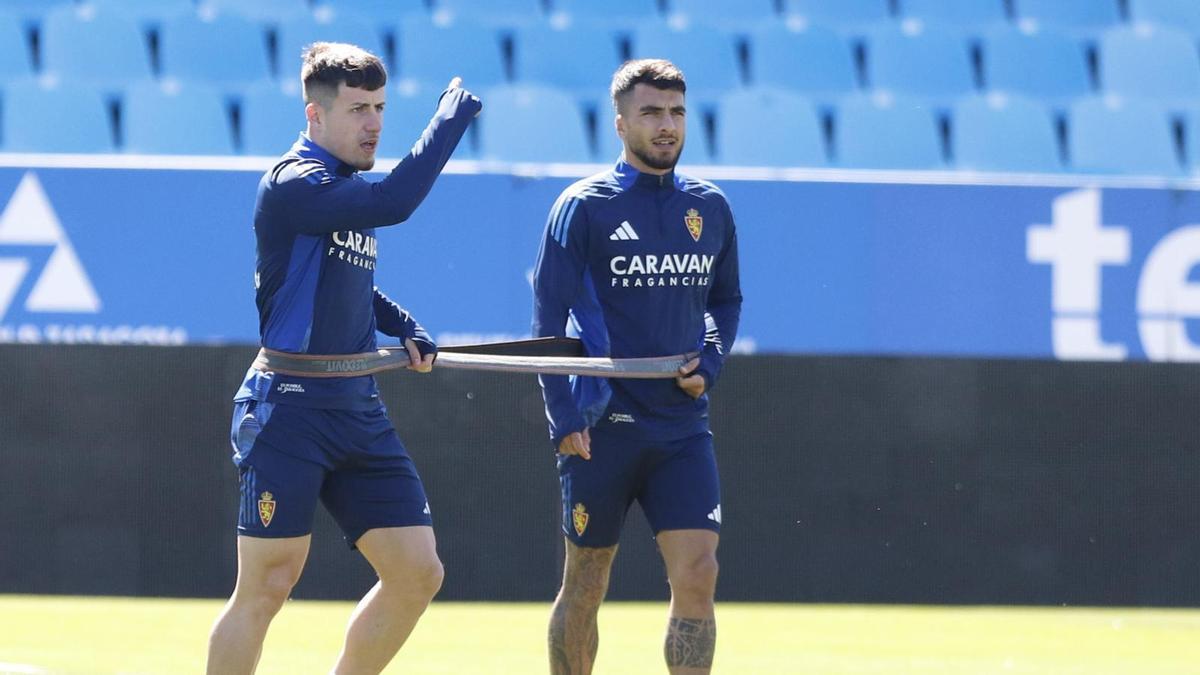 Tasende, junto a Liso en el entrenamiento de este miércoles.