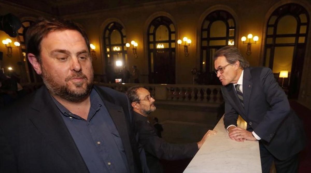 Oriol Junqueras, Artur Mas i Antonio Baños després del ple del Parlament del passat dia 10.