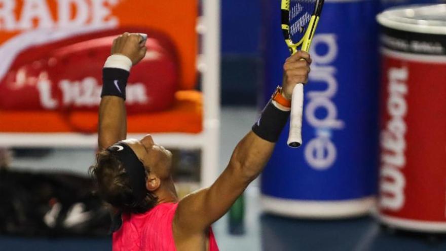 Nadal celebra su triunfo ante Dimitrov.