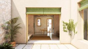 Recración virtual del futuro de una de las casitas del pasaje Pons de LHospitalet.