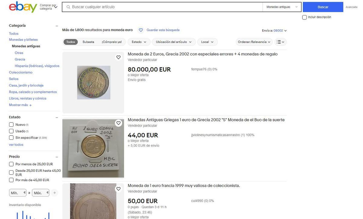 Captura de la página de Ebay con algunos anuncios de monedas.