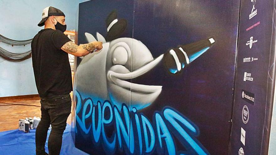 Elaboración dun graffitti durante a presentación do Revenidas.