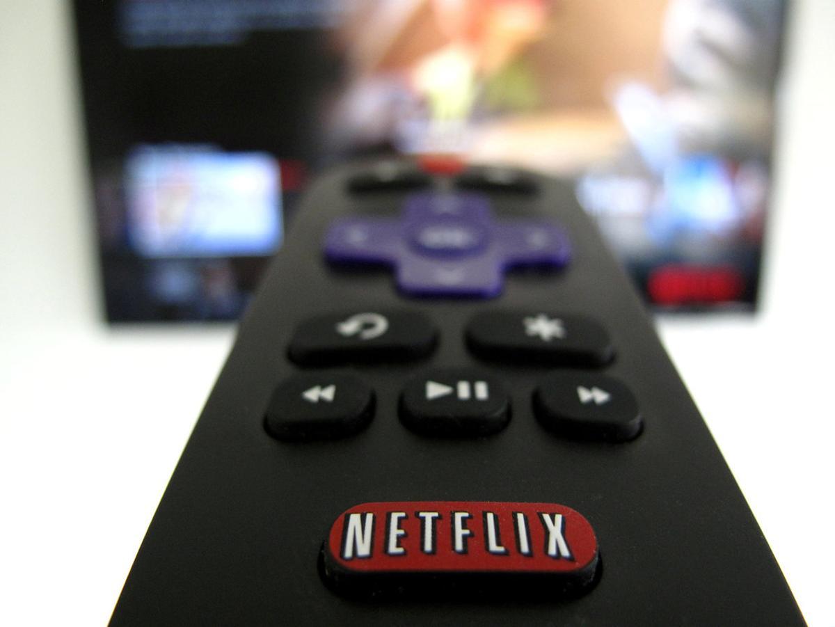 FILE PHOTO: The Netflix logo is pictured on a television remote in this illustration photograph taken in Encinitas, California, U.S., on January 18, 2017.  REUTERS/Mike Blake/File Photo                     GLOBAL BUSINESS WEEK AHEAD     SEARCH GLOBAL BUSINESS 16 OCT FOR ALL IMAGES