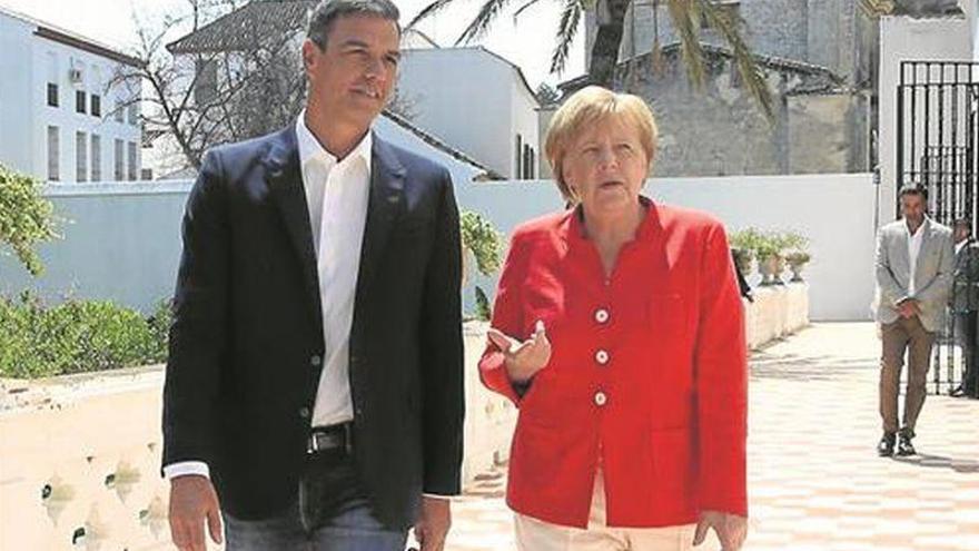 Sánchez y Merkel pactan ayuda urgente para Marruecos