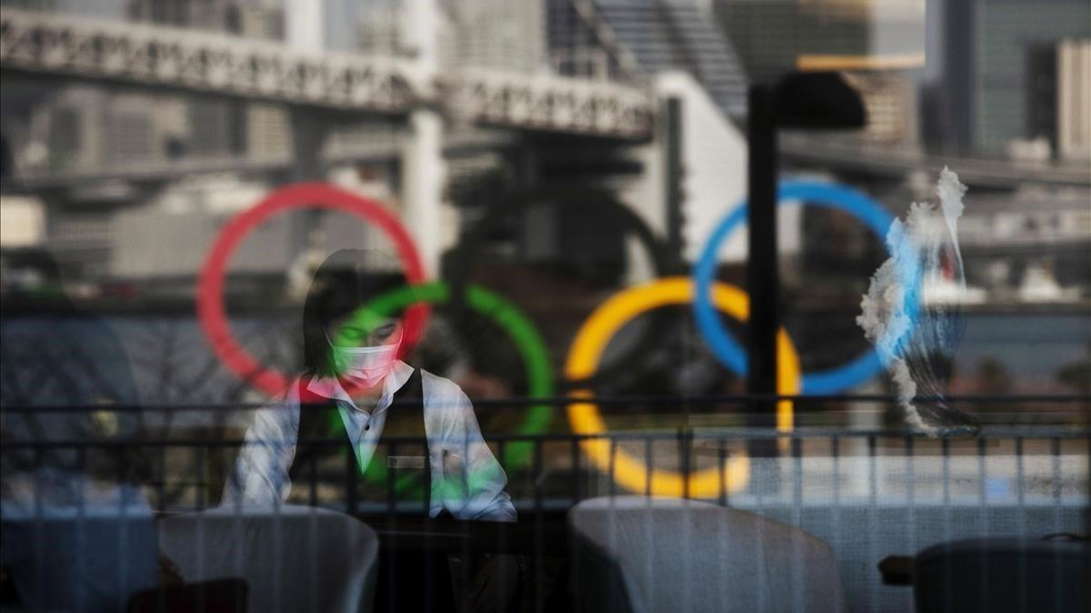 rpaniagua52473908 the olympics rings are reflected on the window of a hotel re200225184442