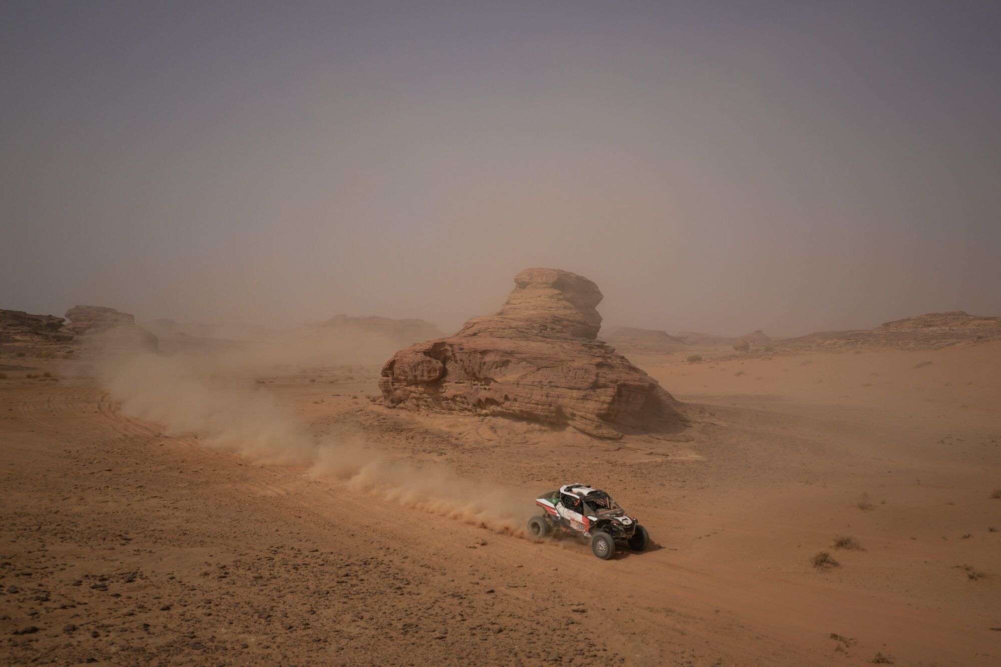 Driver Hassan Jameel and co-driver Maciej Giemza compete during the third stage of the Dakar Rally with a start and finish in Alula, Saudi Arabia, Tuesday, Jan. 6, 2026. (AP Photo/Thibault Camus)