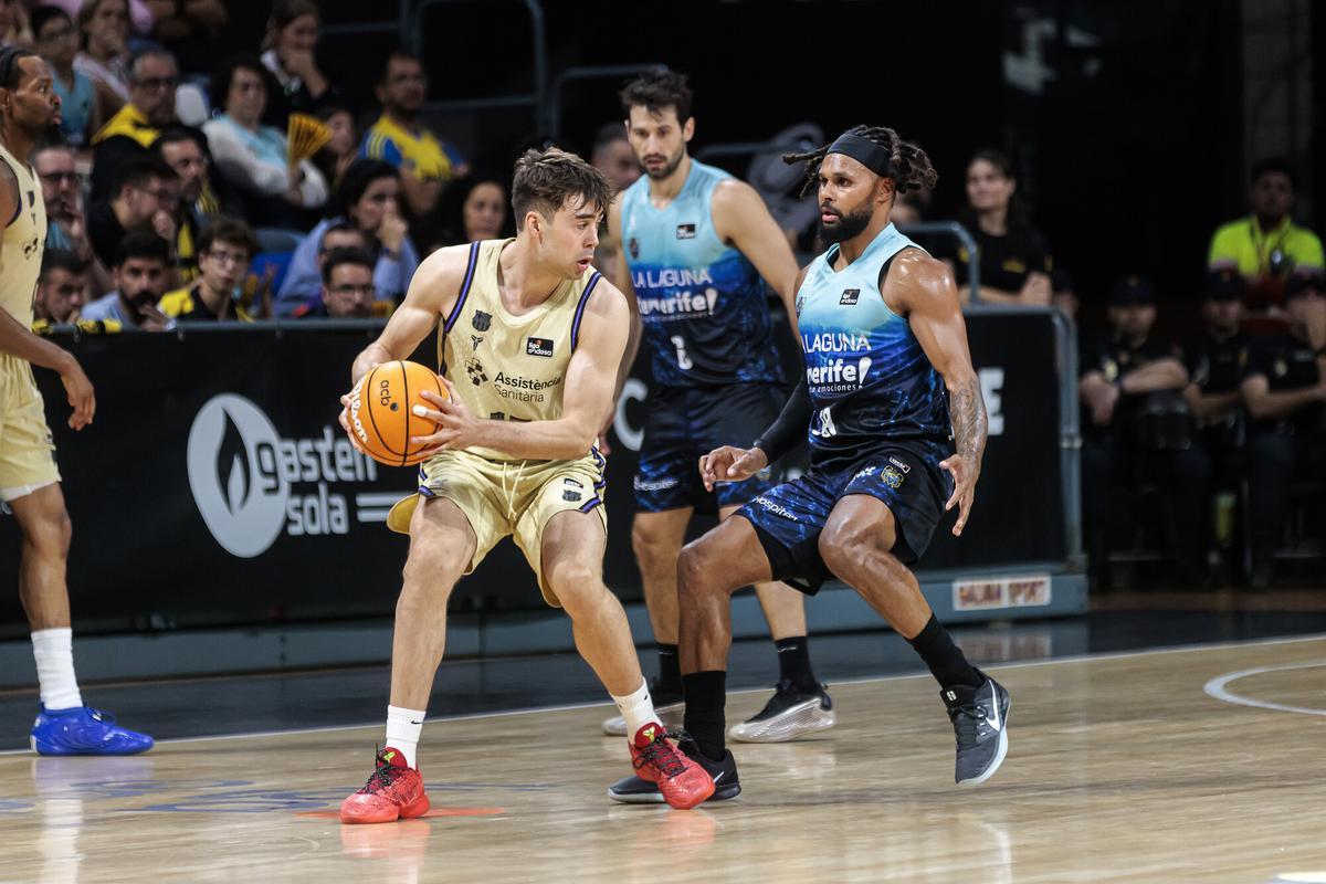 Bruno Fitipaldo y Patty Mills, en acción defensiva contra el Barça.