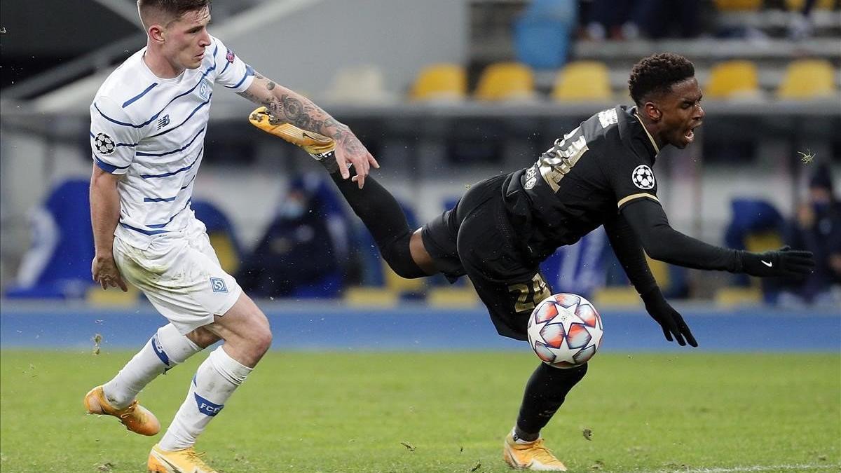 Verbic y Firpo, en el partido de Champions de Kiev.