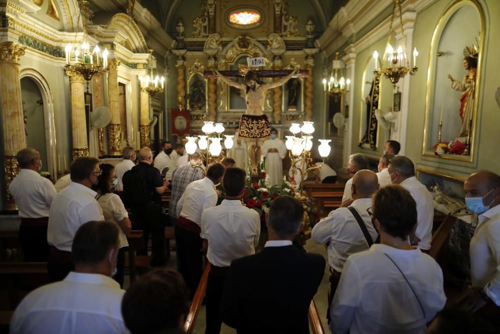 Procesión en la calle del Cristo de la Salud del Palmar