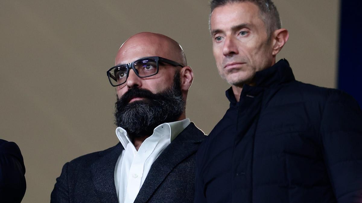 Carlos Bucero, a la izquierda y junto a Andrea Berta, exdirector deportivo del Atlético.