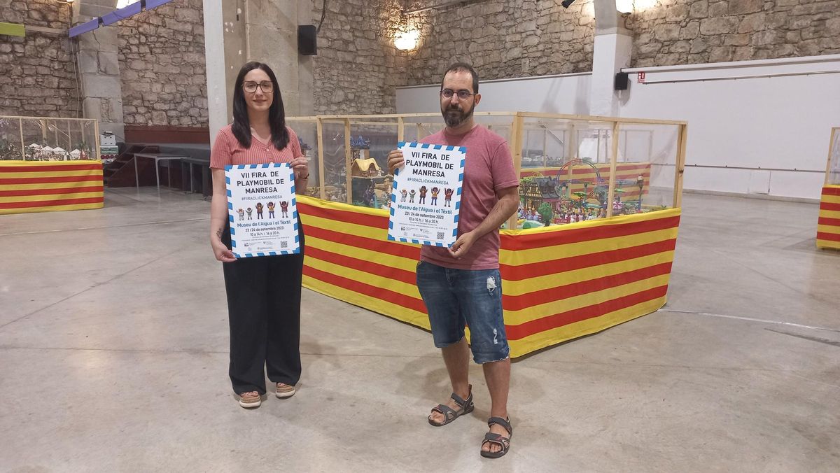 Eudald Serra i Tània Infante amb el cartell de la 7a edició de la fira