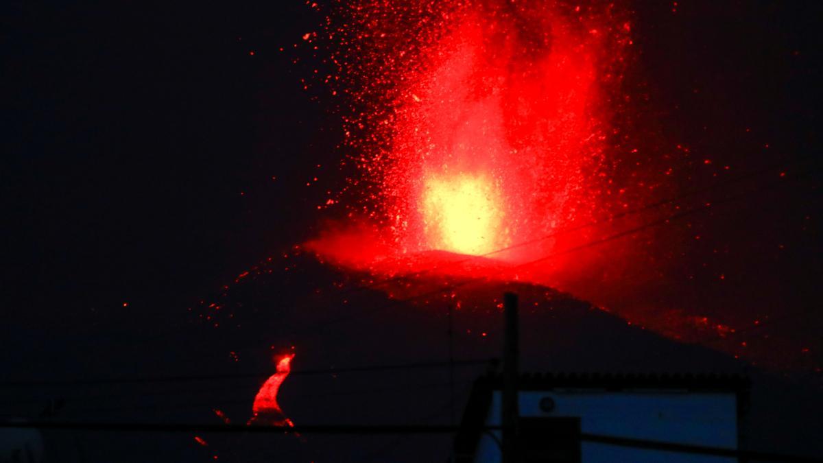 Lava and smoke rise following the eruption of a volcano on Spanish Canary Island of La Palma