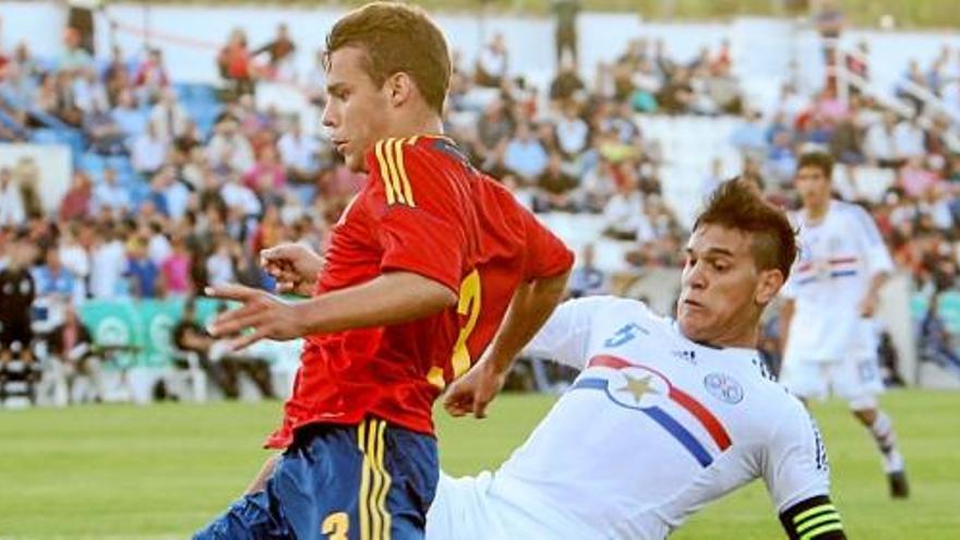 Juan Bernat durante un partido con &quot;la rojita&quot;