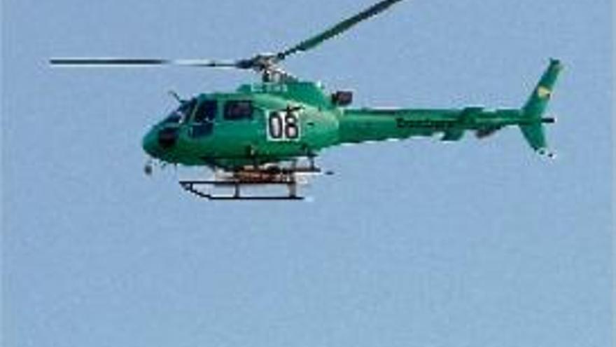 Un dels helicòpters de Salvament que ha treballat aquests dies a Tossa.