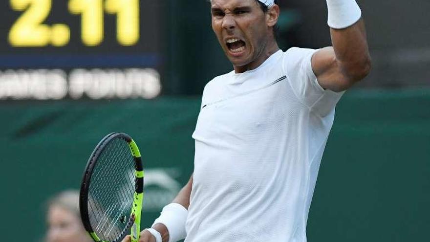 Nadal festeja su victoria sobre Young. // Reuters