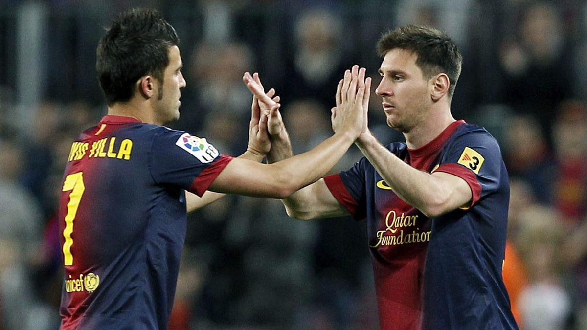 David Villa y Messi, felicitándose por un gol durante su etapa en Barça.