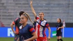 Bayern Munichs players including German forward #17 Klara Buhl (R) warm up prior to the UEFA Womens Champions League semi-final first leg football match between FC Bayern Munich and FC Barcelona in Munich, southern Germany on April 25, 2026. (Photo by Karl-Josef HILDENBRAND / AFP)
