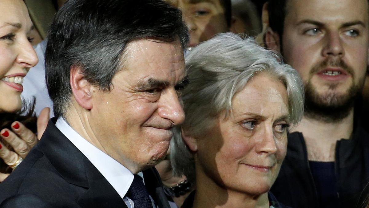 Francois Fillon, member of Les Republicains political party and 2017 presidential candidate of the French centre-right, and his wife Penelope attend a political rally in Paris