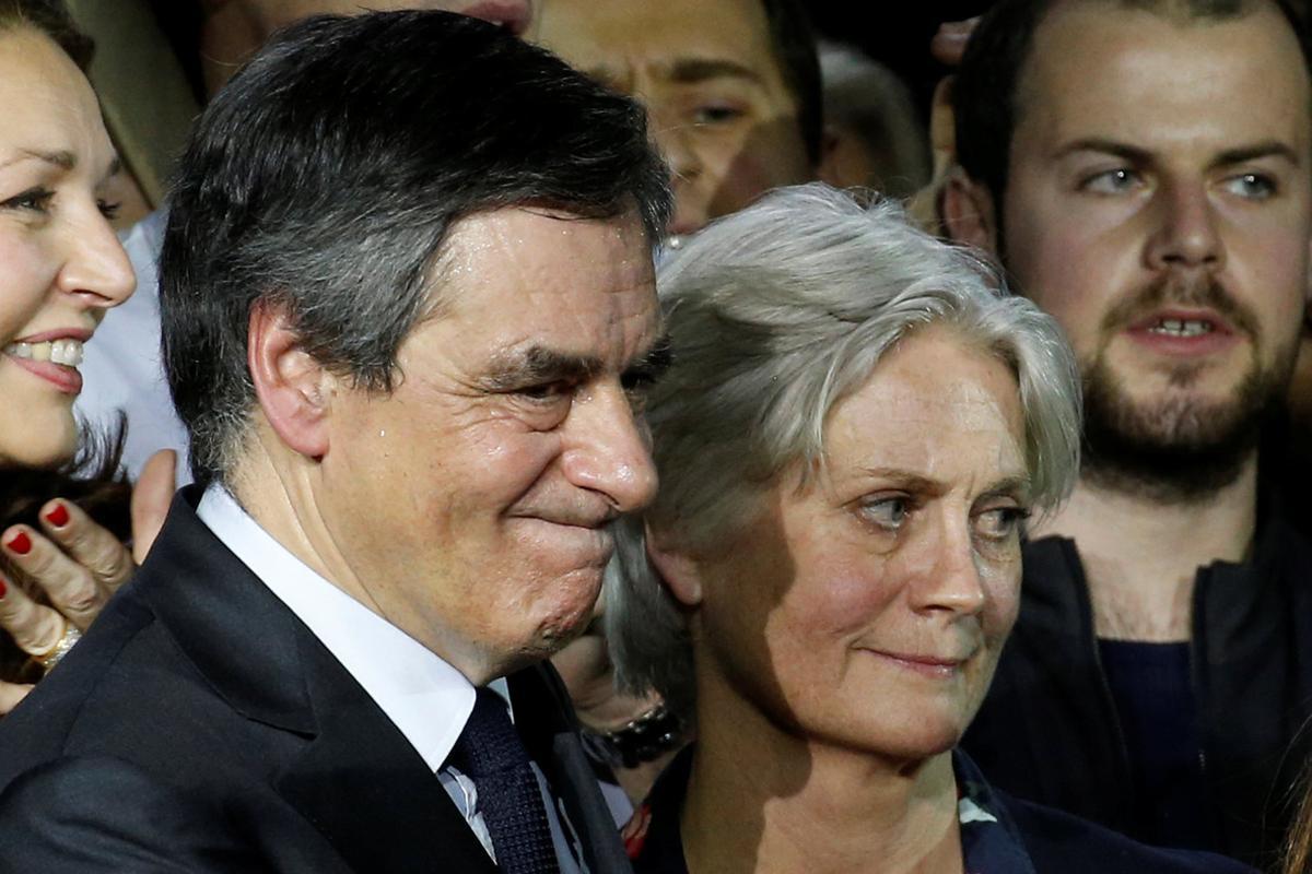 Francois Fillon, member of Les Republicains political party and 2017 presidential candidate of the French centre-right, and his wife Penelope attend a political rally in Paris, France, January 29, 2017. Picture taken January 29, 2017. REUTERS/Pascal Rossignol