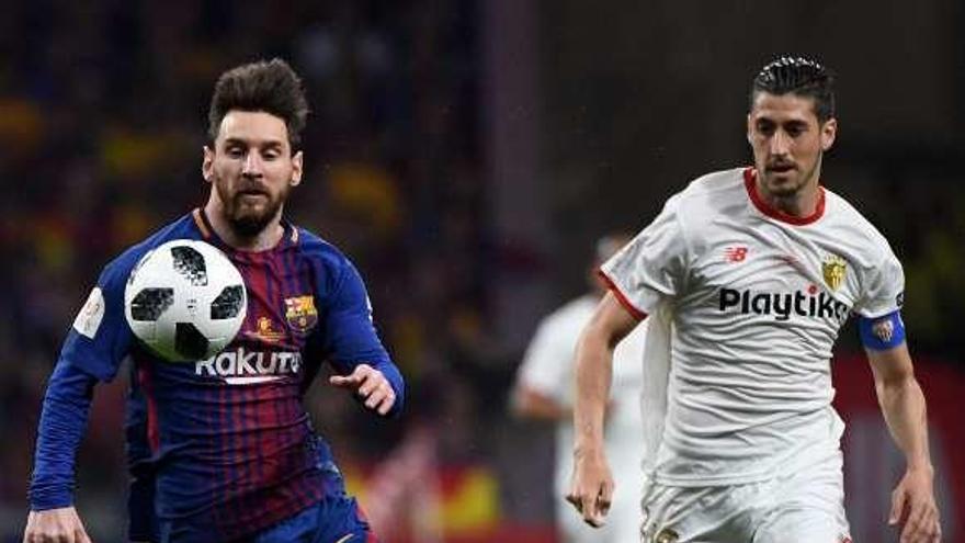 Messi y Escudero en la pasada final de Copa.