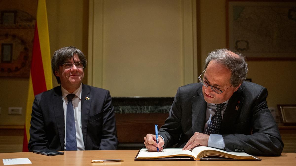 Els expresidents de la Generalitat Carles Puigdemont i Quim Torra