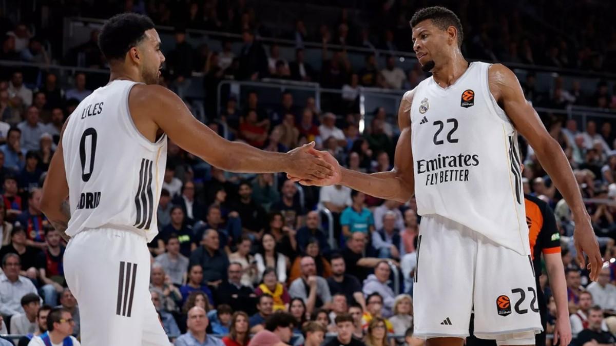 Trey Lyles y Walter Tavares