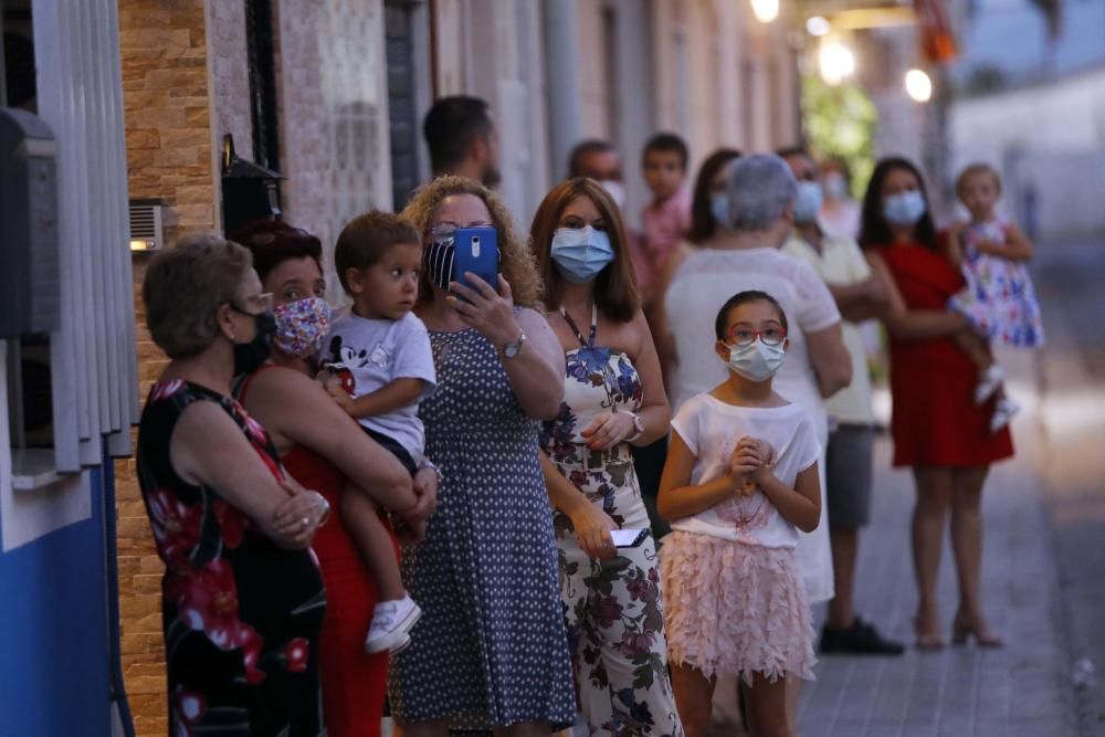 Procesión en la calle del Cristo de la Salud del Palmar