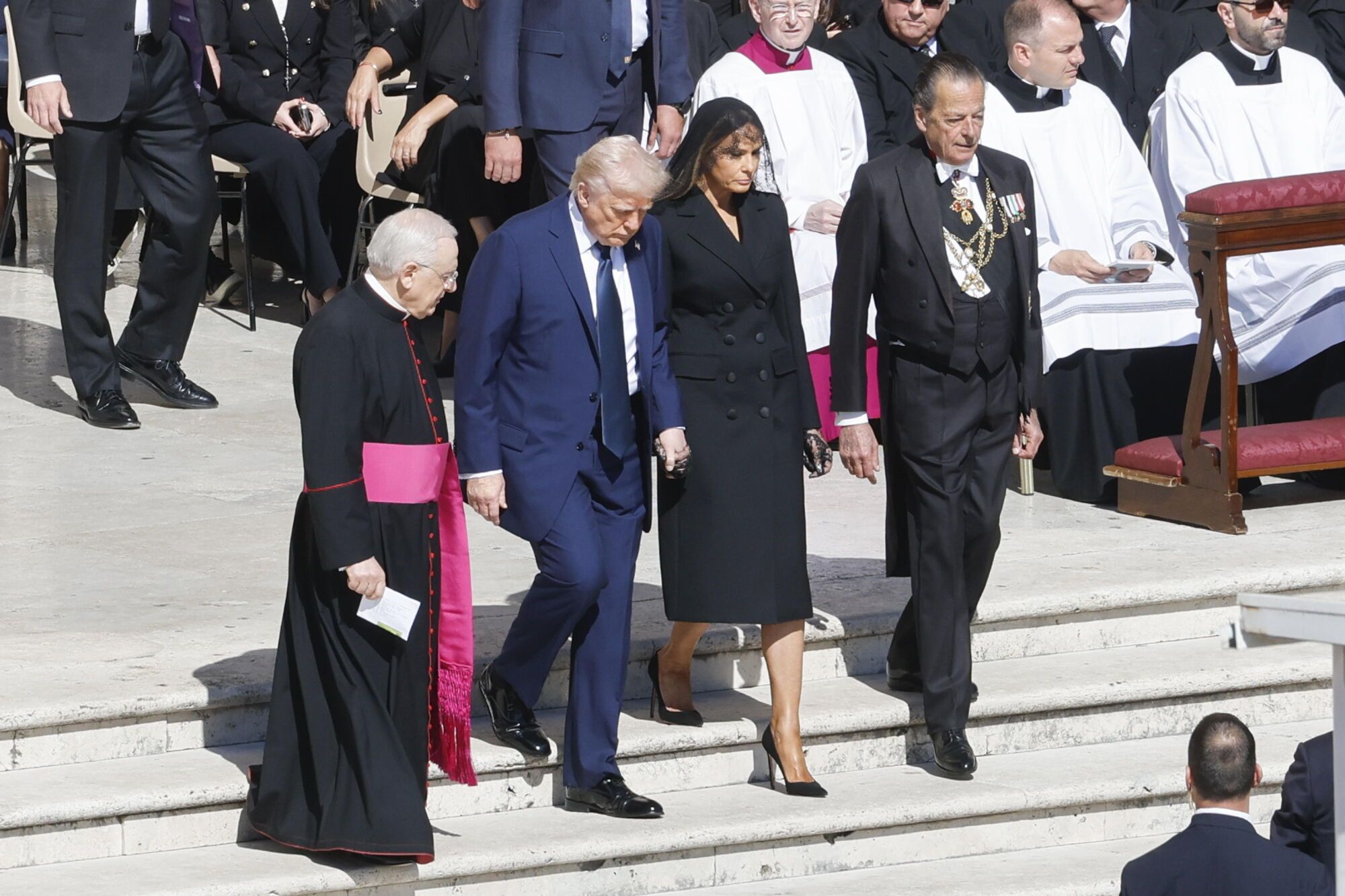 VATICAN CITY (Vatican City State (Holy See)), 26/04/2025.- US President Donald Trump and First Lady Melania Trump arrive at the funeral of Pope Francis in Saint Peter's Square, Vatican City, 26 April 2025. Pope Francis passed away on Easter Monday, 21 April 2025, at the age of 88. (Papa) EFE/EPA/FABIO FRUSTACI